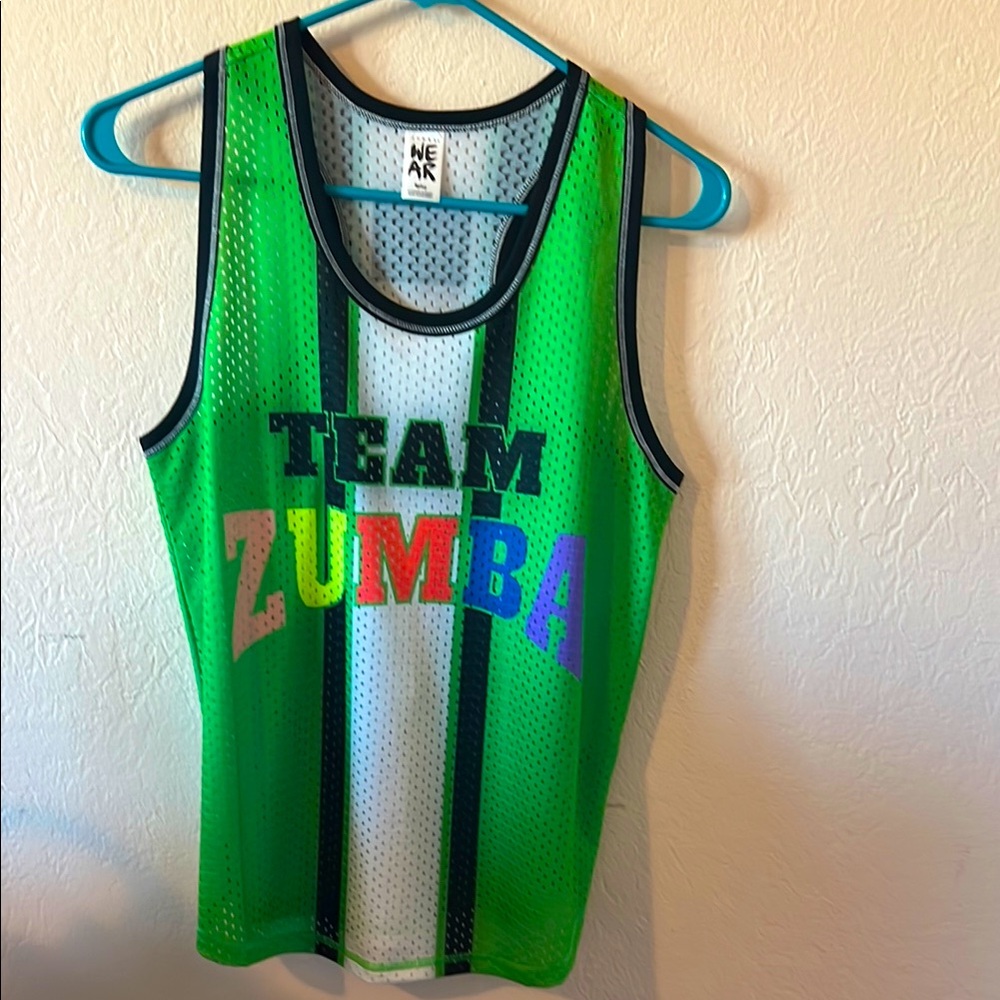 Two GENTLY used Zumba shirts size Spicy (small) super great condition.
